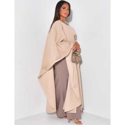 Long cape in textured fabric