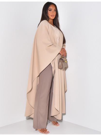 Long cape in textured fabric